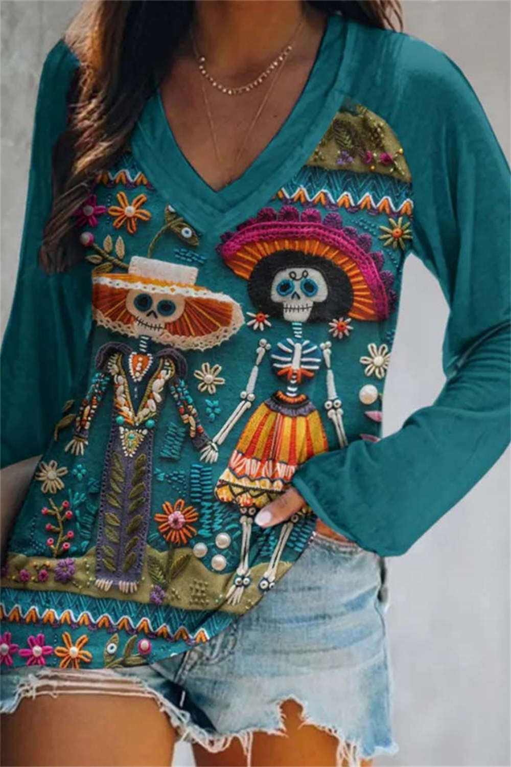 Andrea | Halloween-geïnspireerde Teal Skelet Print V Hals Lange Mouwen Blouse